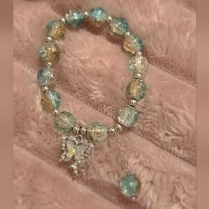 Elegant Beaded Bracelet with Butterfly Charm